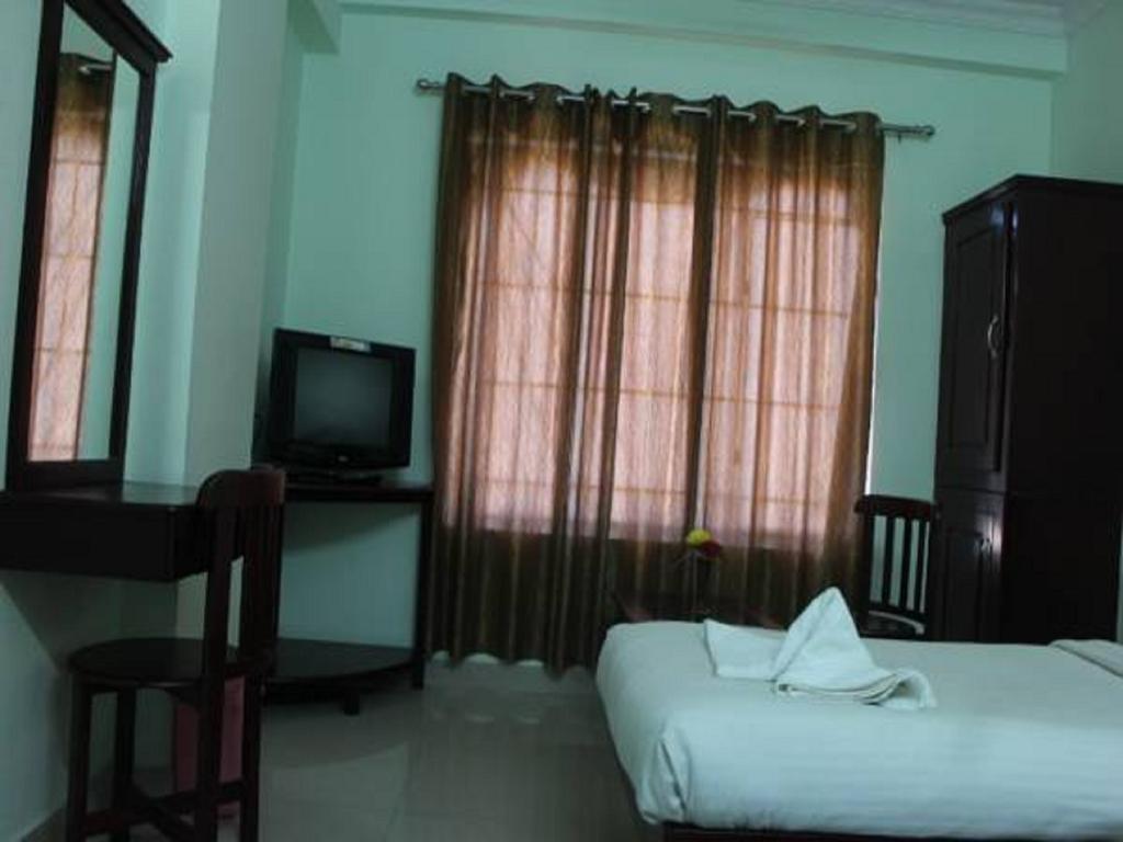 Sm Regency Kochi Δωμάτιο φωτογραφία